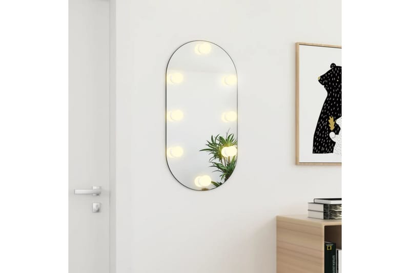 Spegel med LED-lampor 80x40 cm glas oval - Silver - Väggspegel - Hallspegel