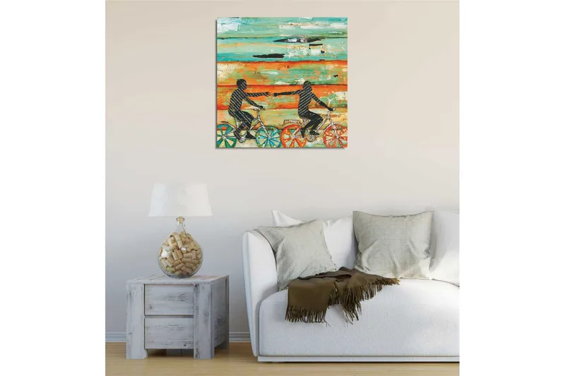 Canvastavla 45x45 cm - Cyklande personer som sträcker ut händerna mot varandra - Turkos / Orange / Svart - Inredning - Tavlor & konst - Canvastavlor