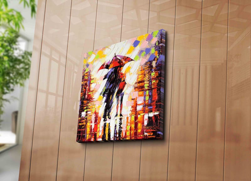 Canvastavla 45x45 cm - Silhuett av en person med paraply i en färgglad stadsmiljö - Röd / Orange / Svart - Inredning - Tavlor & konst - Canvastavlor