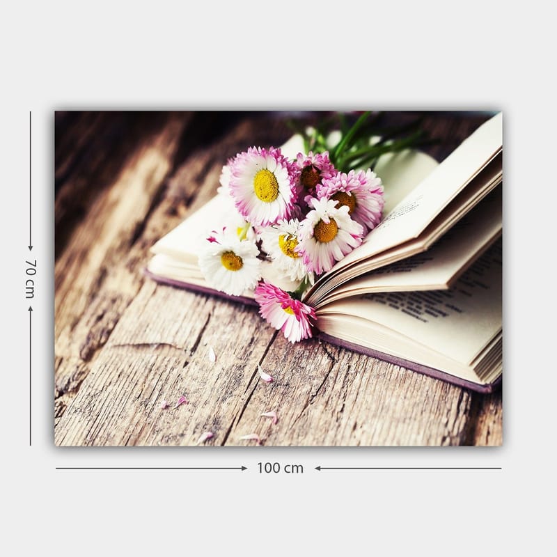 Canvastavla 70x100 cm - Bukett med blommor placerad på en öppen bok - Vit / Rosa / Gul - Inredning - Tavlor & konst - Canvastavlor