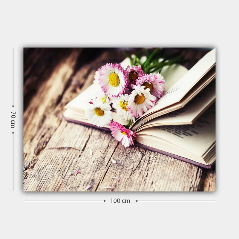 Canvastavla 70x100 cm - Bukett med blommor placerad på en öppen bok - Vit / Rosa / Gul - Inredning - Tavlor & konst - Canvastavlor