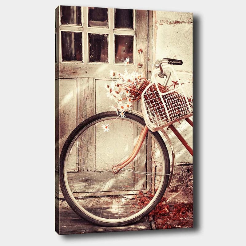 Canvastavla 70x100 cm - Cykel med en korg fylld med blommor framför en gammal dörr, Grå / Brun / Vit