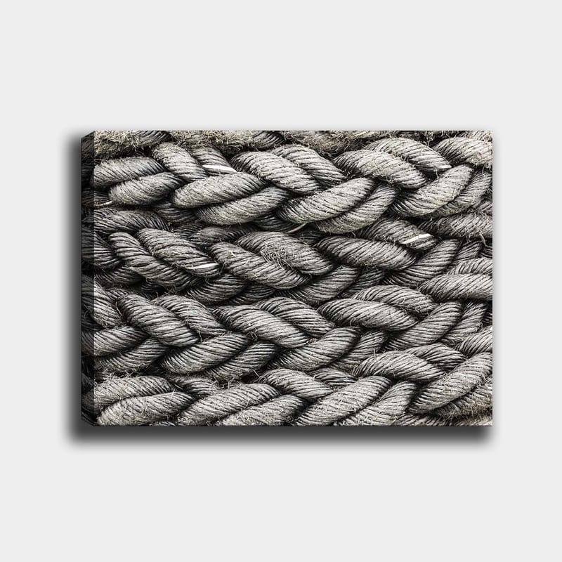 Canvastavla 70x100 cm - Detaljerad närbild av flätat rep med en textur som framhäver dess struktur och materialitet - Grå / Svart - Inredning - Tavlor & konst - Canvastavlor
