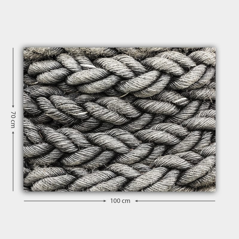 Canvastavla 70x100 cm - Detaljerad närbild av flätat rep med en textur som framhäver dess struktur och materialitet - Grå / Svart - Inredning - Tavlor & konst - Canvastavlor