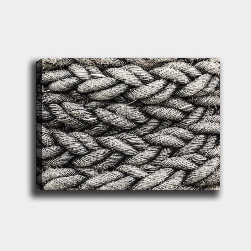 Canvastavla 70x100 cm - Detaljerad närbild av flätat rep med en textur som framhäver dess struktur och materialitet - Grå / Svart - Inredning - Tavlor & konst - Canvastavlor
