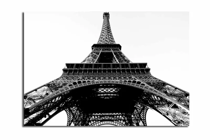Canvastavla 70x100 cm - Dramatisk vy av Eiffeltornet sedd från marken uppåt, Svart / Vitt