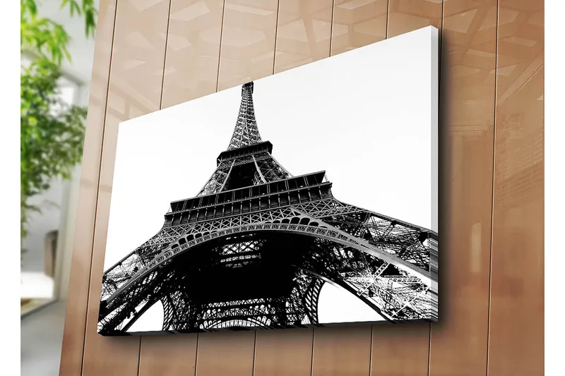 Canvastavla 70x100 cm - Dramatisk vy av Eiffeltornet sedd från marken uppåt - Svart / Vitt - Inredning - Tavlor & konst - Canvastavlor