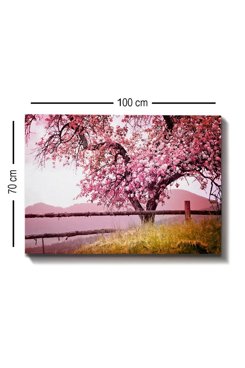 Canvastavla 70x100 cm - Ett blommande körsbärsträd i en idyllisk landskapsmiljö - Rosa / Grön / Brun - Inredning - Tavlor & konst - Canvastavlor