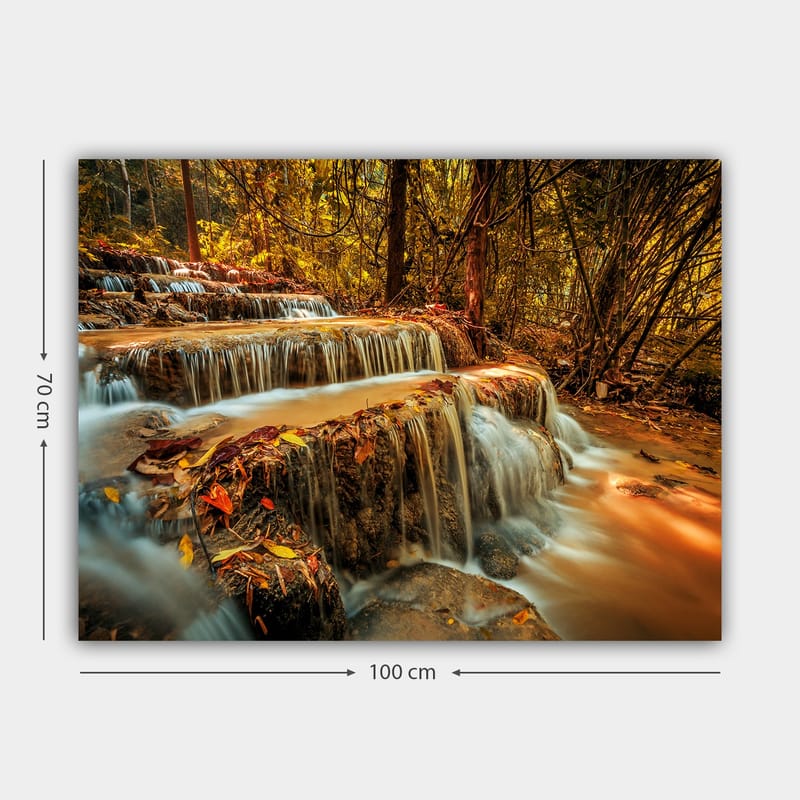 Canvastavla 70x100 cm - Ett vackert vattenfall som rinner ner för flera nivåer i en höstfärgad skog - Guld / Brunt / Orange - Inredning - Tavlor & konst - Canvastavlor