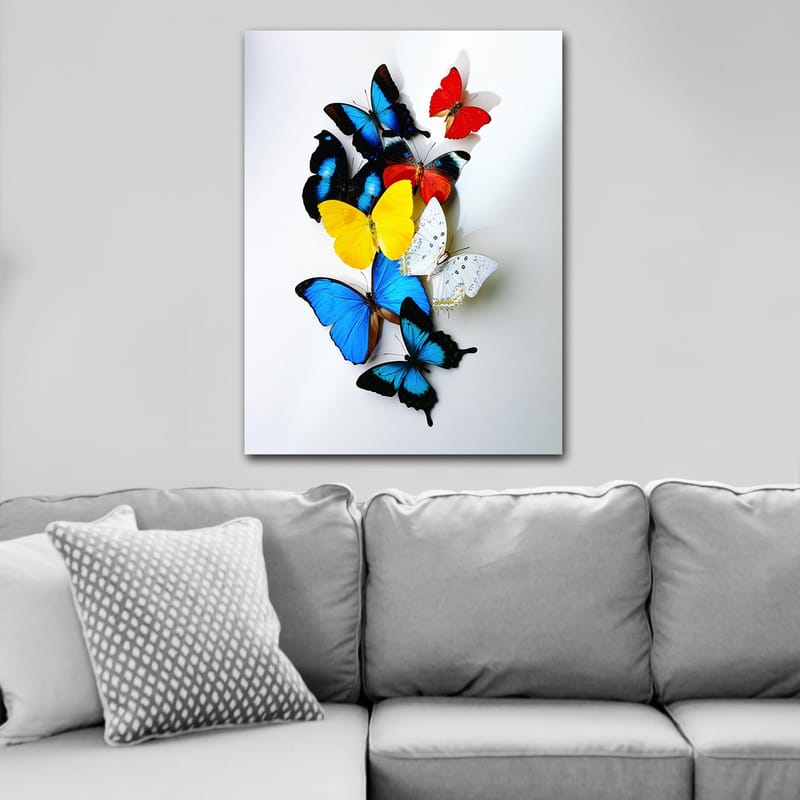 Canvastavla 70x100 cm - Färgglad samling av fjärilar i olika nyanser som skapar en livfull och dynamisk komposition - Blå / Gul / Röd - Inredning - Tavlor & konst - Canvastavlor