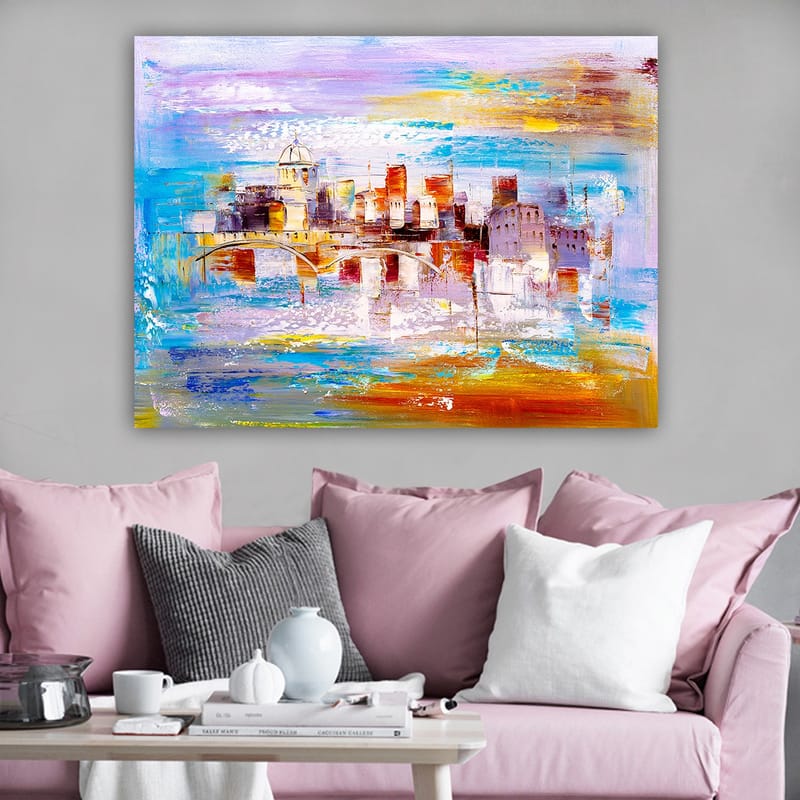 Canvastavla 70x100 cm - Färgglad stadsbild med en bro som sträcker sig över en vattenyta - Blå / Orange / Lila - Inredning - Tavlor & konst - Canvastavlor