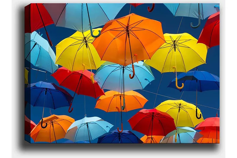 Canvastavla 70x100 cm - Färgglada paraplyer som svävar i luften - Röd / Blå / Gul - Inredning - Tavlor & konst - Canvastavlor