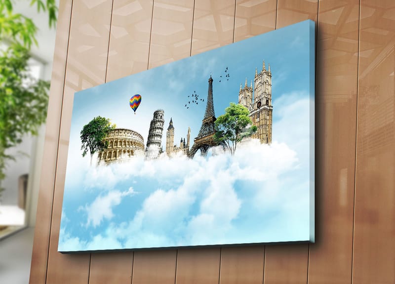 Canvastavla 70x100 cm - Fantasifull landskap med kända byggnader svävande bland moln - Blå / Grön / Vit - Inredning - Tavlor & konst - Canvastavlor