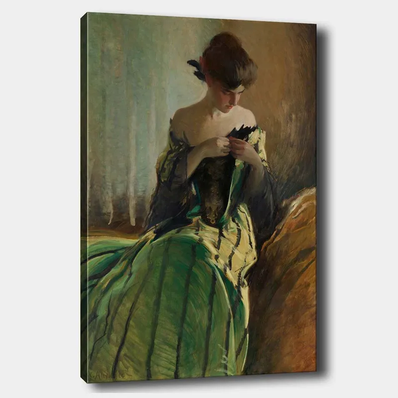 Canvastavla 70x100 cm - Kvinna i en grön klänning sitter och arbetar med något i händerna, djupt försjunken i sina tankar, Grön / Svart / Beige