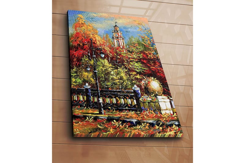 Canvastavla 70x100 cm - Livlig höstscen med en klocktorn i bakgrunden omgiven av färgglada träd och lampor - Röd / Orange / Grön - Inredning - Tavlor & konst - Canvastavlor