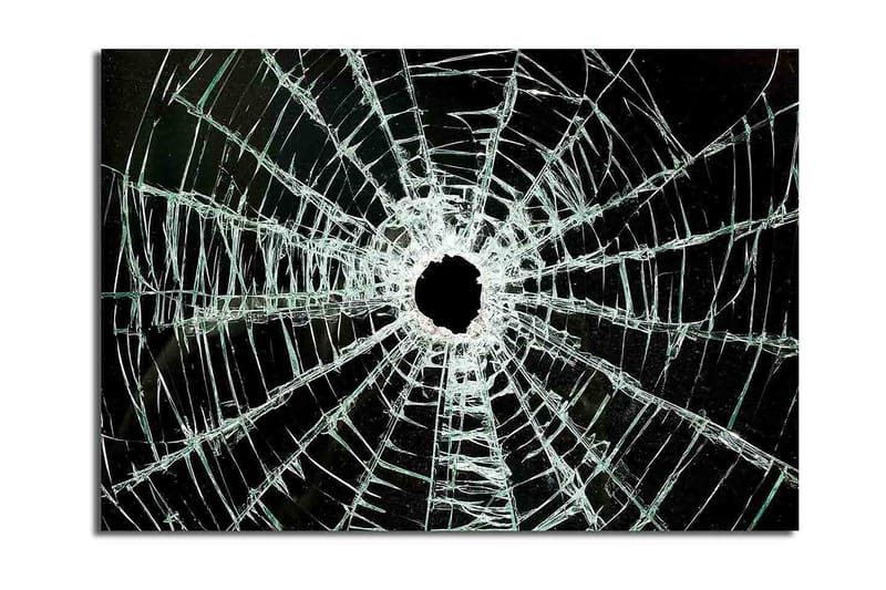 Canvastavla 70x100 cm - Närbild av en sprucken glasruta med ett centralt hål och sprickor som sträcker sig utåt - Svart / Genomskinlig - Inredning - Tavlor & konst - Canvastavlor