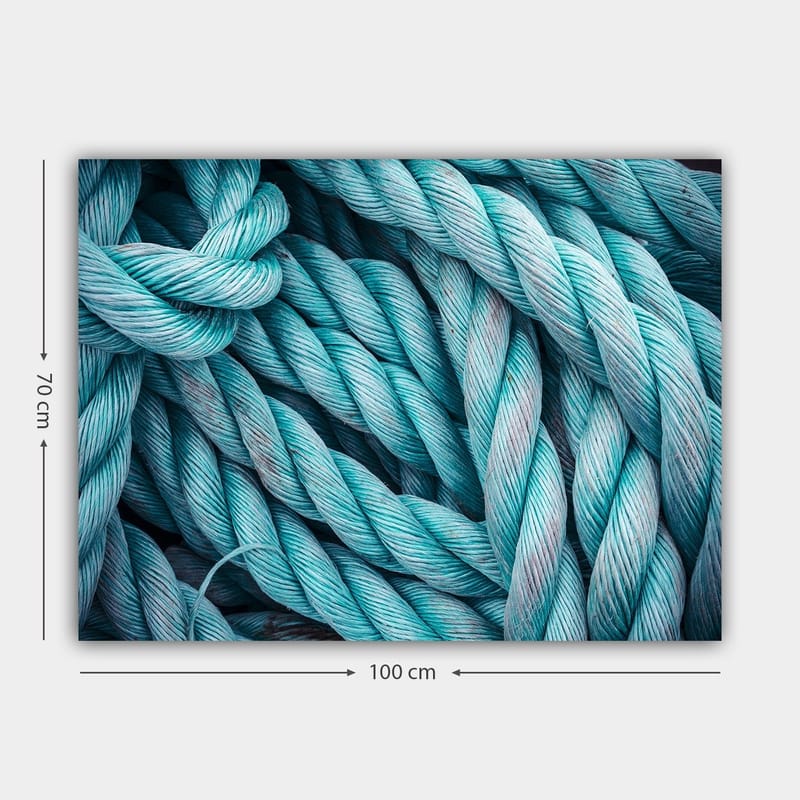 Canvastavla 70x100 cm - Närbild av sammanflätade rep som skapar en dynamisk och texturerad komposition - Turkos / Ljusblå - Inredning - Tavlor & konst - Canvastavlor