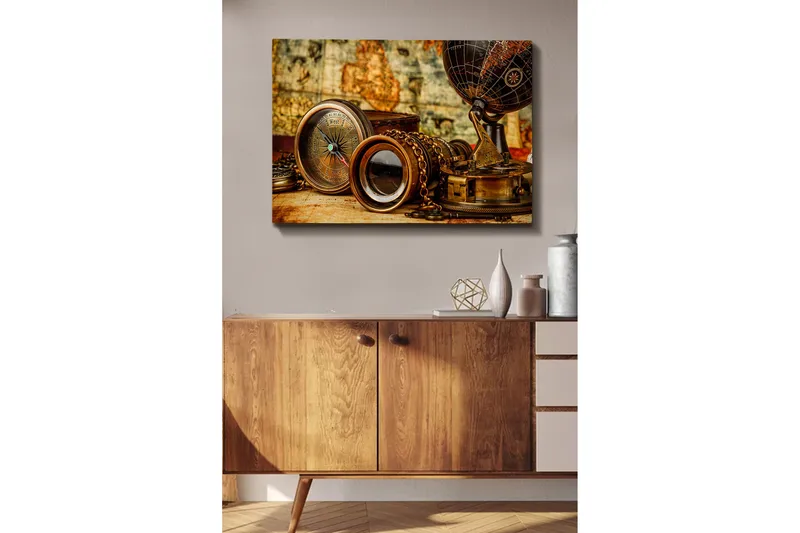 Canvastavla 70x100 cm - Samling av antika navigationsverktyg och en glob som symboliserar utforskning och äventyr - Brons / Svart / Beige - Inredning - Tavlor & konst - Canvastavlor