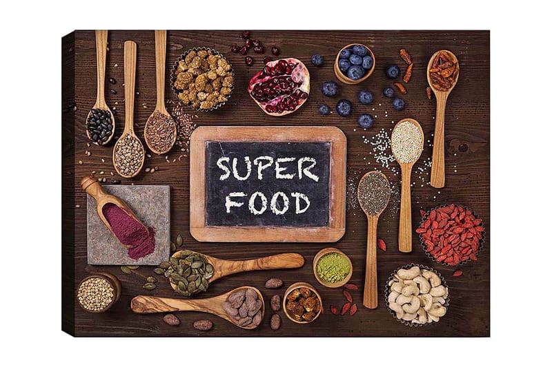 Canvastavla 70x100 cm - Samling av superfoods arrangerade på en träyta med en tavla som visar texten SUPER FOOD, Röd / Grön / Svart