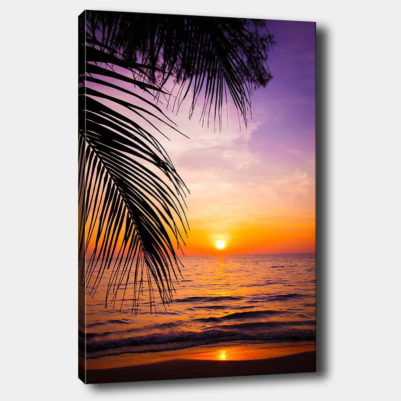 Canvastavla 70x100 cm - Solnedgång över havet med palmer i förgrunden, Lila / Orange / Gult