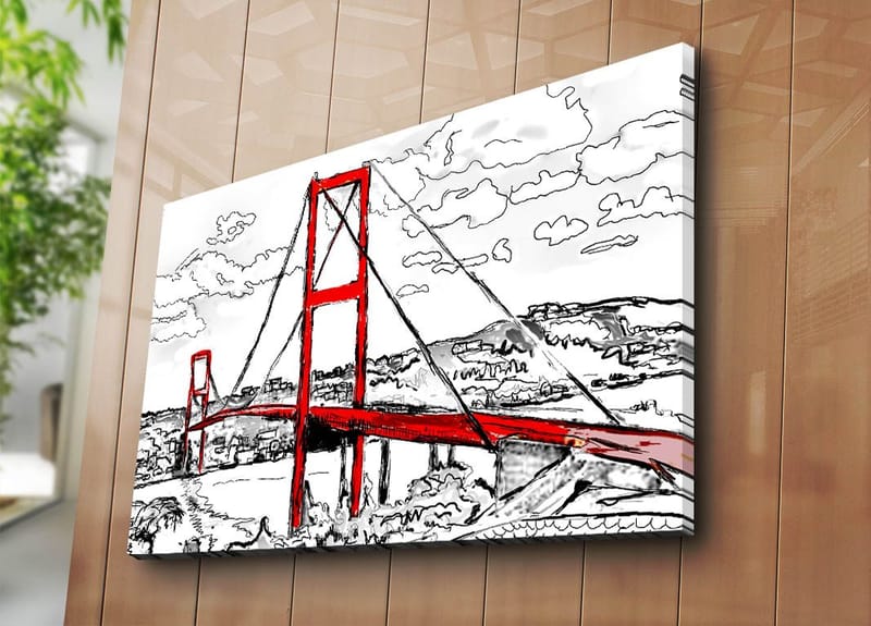 Canvastavla 70x100 cm - Stiliserad bild av en röd hängbro med omgivande landskap i svart och vitt - Röd / Svart - Inredning - Tavlor & konst - Canvastavlor