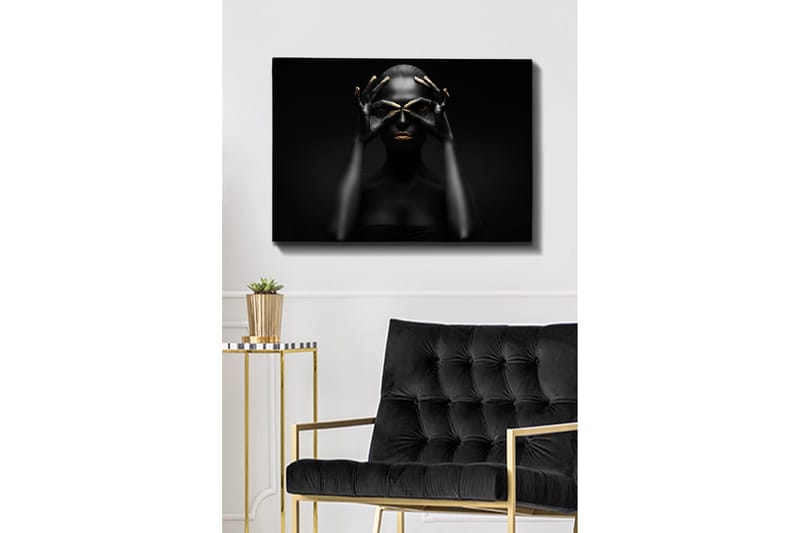 Canvastavla 70x100 cm - Stiliserad porträttbild av en kvinna med svarta händer som formar ett par ögon, med guldiga detaljer på läppar och fingertoppar - Svart / Guld - Inredning - Tavlor & konst - Canvastavlor