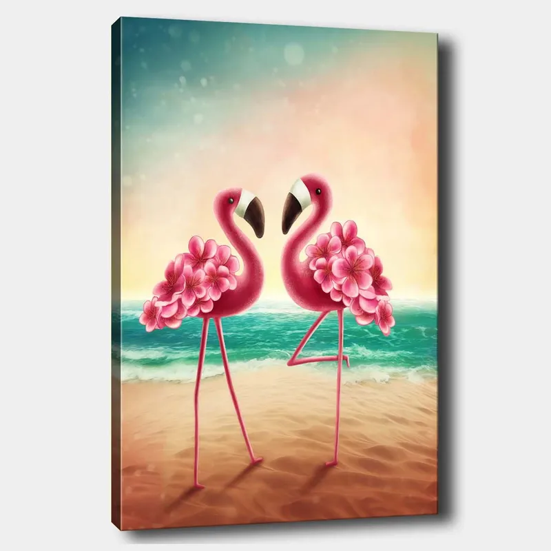 Canvastavla 70x100 cm - Två flamingos med blommor som står på en strand vid havet, Rosa / Turkos / Beige