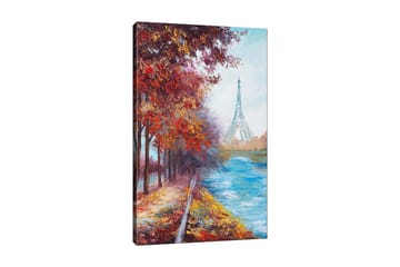 Canvastavla 70x100 cm - Vacker höstscen med Eiffeltornet i bakgrunden, omgiven av färgglada träd och en glittrande flod - Röd / Blå / Orange - Inredning - Tavlor & konst - Canvastavlor