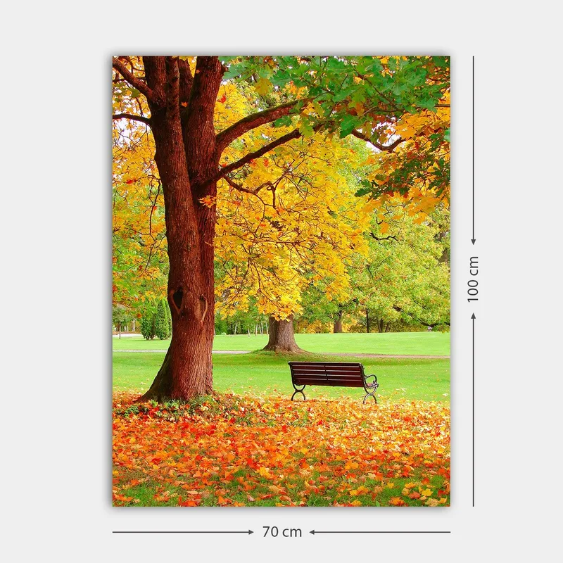 Canvastavla 70x100 cm - Vacker höstscen med en bänk under ett färgsprakande träd - Guldgul / Orange / Brun - Inredning - Tavlor & konst - Canvastavlor