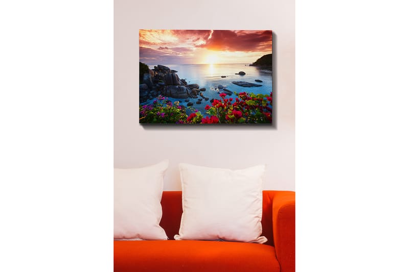 Canvastavla 70x100 cm - Vacker solnedgång över havet med klippor och färgglada blommor i förgrunden - Rosa / Blå / Orange - Inredning - Tavlor & konst - Canvastavlor