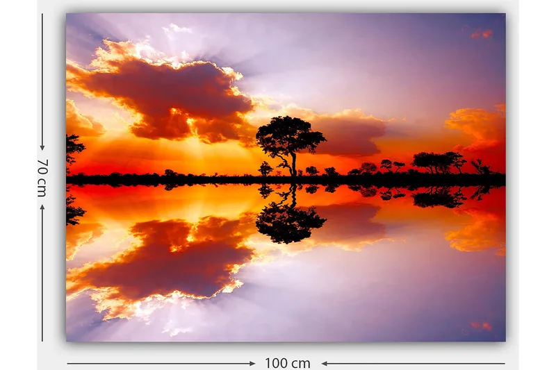Canvastavla 70x100 cm - Vacker solnedgång med silhuetter av träd som speglas i en stilla vattenyta - Orange / Lila / Svart - Inredning - Tavlor & konst - Canvastavlor