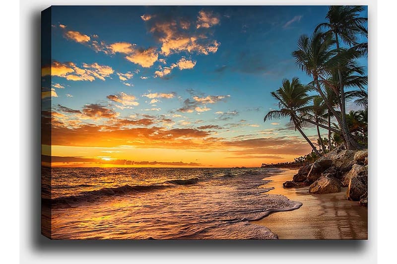Canvastavla 70x100 cm - Vacker solnedgång vid en strand med palmer och mjuka vågor som rullar in mot sanden - Orange / Blå / Beige - Inredning - Tavlor & konst - Canvastavlor