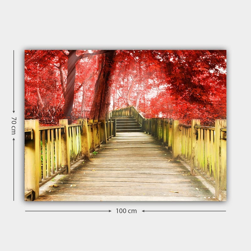 Canvastavla 70x100 cm - Vacker träbro omgiven av lysande röda träd i en höstig miljö - Röd / Gulgrön - Inredning - Tavlor & konst - Canvastavlor