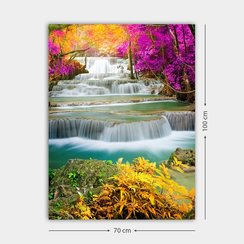 Canvastavla 70x100 cm - Vacker vattenfallsscen omgiven av färgglada träd och växter - Lila / Grön / Orange - Inredning - Tavlor & konst - Canvastavlor