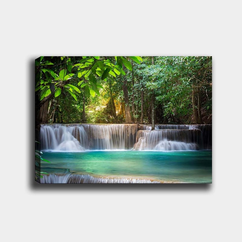 Canvastavla 70x100 cm - Vacker vattenfallsscen omgiven av frodig grönska, Grön / Turkos / Brun