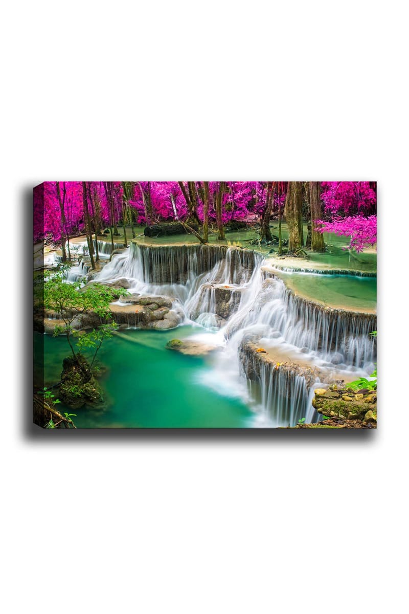 Canvastavla 70x100 cm - Vacker vattenfallsscen omgiven av frodig grönska och rosa blommor, Turkos / Rosa / Grön