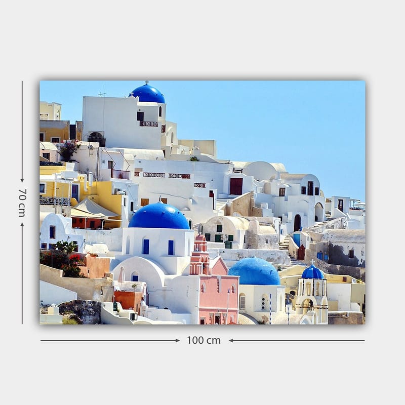 Canvastavla 70x100 cm - Vacker vy över de karakteristiska vita husen och blå kupolerna i Santorini - Blå / Vit / Rosa - Inredning - Tavlor & konst - Canvastavlor