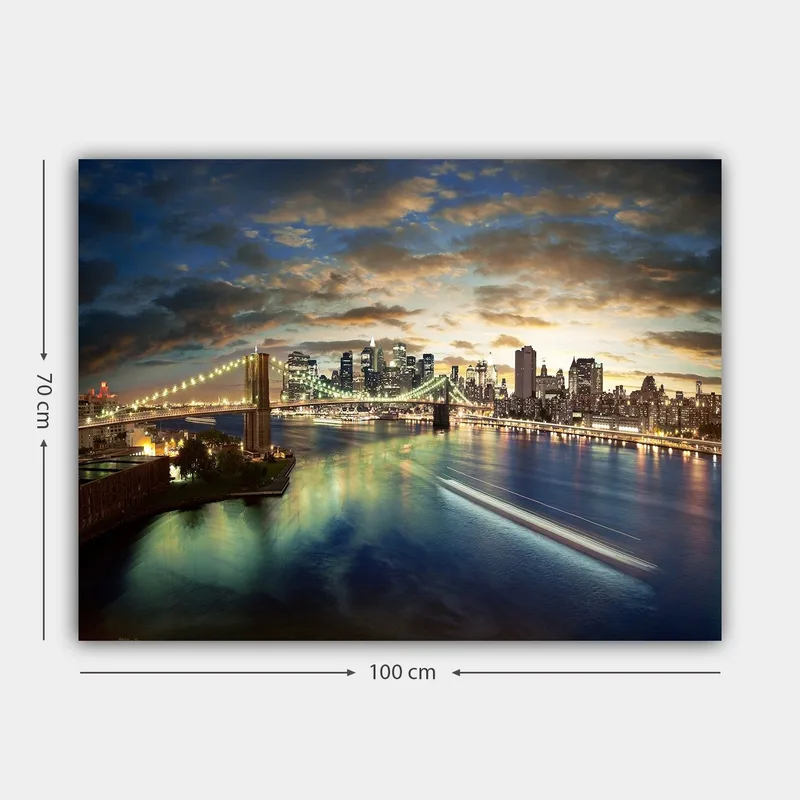Canvastavla 70x100 cm - Vacker vy över en stad med en bro som sträcker sig över en glittrande flod vid skymning - Blå / Grön / Orange - Inredning - Tavlor & konst - Canvastavlor