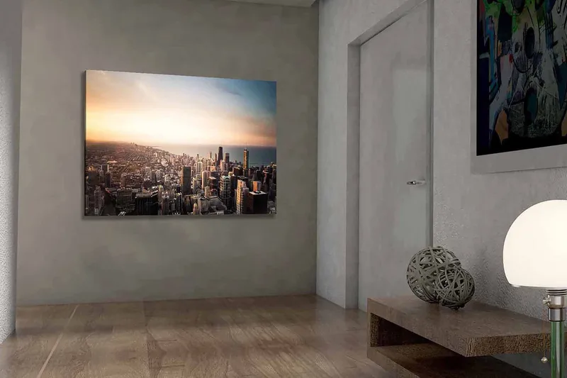 Canvastavla 70x100 cm - Panoramavy av en stad med höga skyskrapor och en solnedgång som skapar en dramatisk atmosfär - Blå / Orange / Grå - Inredning - Tavlor & konst - Canvastavlor