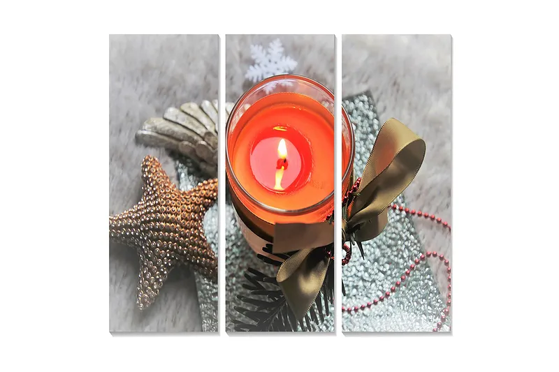 Canvastavla i trä 3-delar 50x70 cm - Ljuslykta med en varm orange ton omgiven av juldekorationer, Orange / Brun / Grön