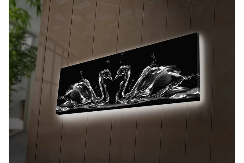 Canvastavla med LED-belysning 30x90 cm - Eleganta svanar i vattenrörelse, Svart / Vitt / Grått