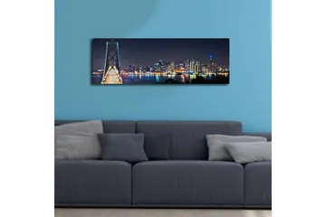 Canvastavla med LED-belysning 30x90 cm - Nattlig stadsbild med en bro och silhuetter av skyskrapor - Mörkblå / Ljusgrön / Vit - Inredning - Tavlor & konst - Canvastavlor