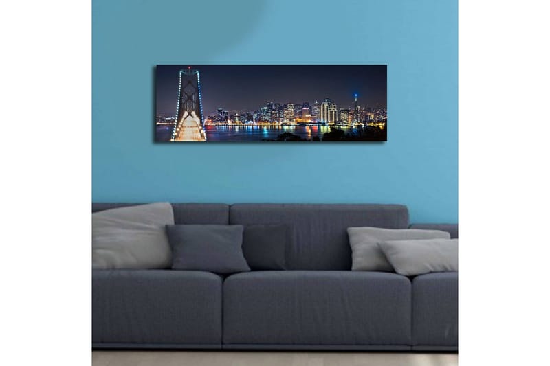 Canvastavla med LED-belysning 30x90 cm - Nattlig stadsbild med en bro och silhuetter av skyskrapor - Mörkblå / Ljusgrön / Vit - Inredning - Tavlor & konst - Canvastavlor