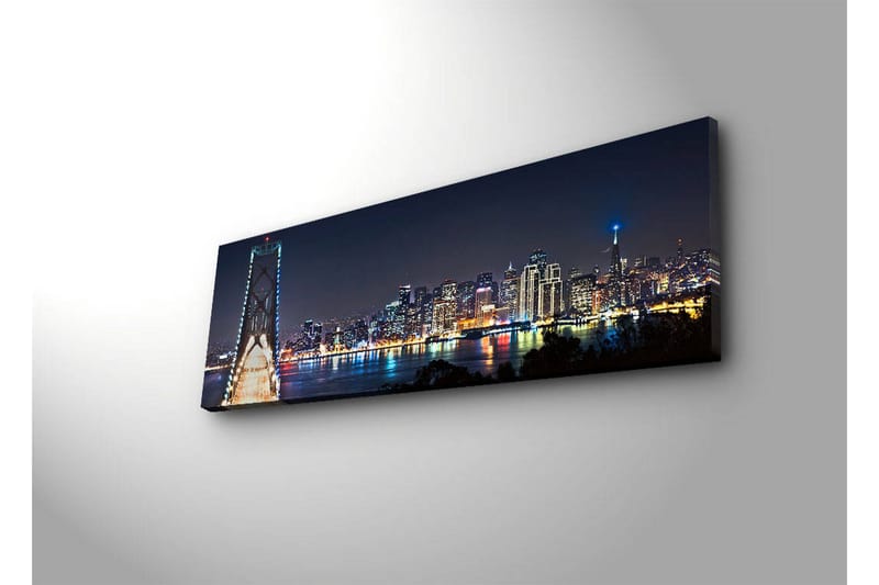 Canvastavla med LED-belysning 30x90 cm - Nattlig stadsbild med en bro och silhuetter av skyskrapor - Mörkblå / Ljusgrön / Vit - Inredning - Tavlor & konst - Canvastavlor