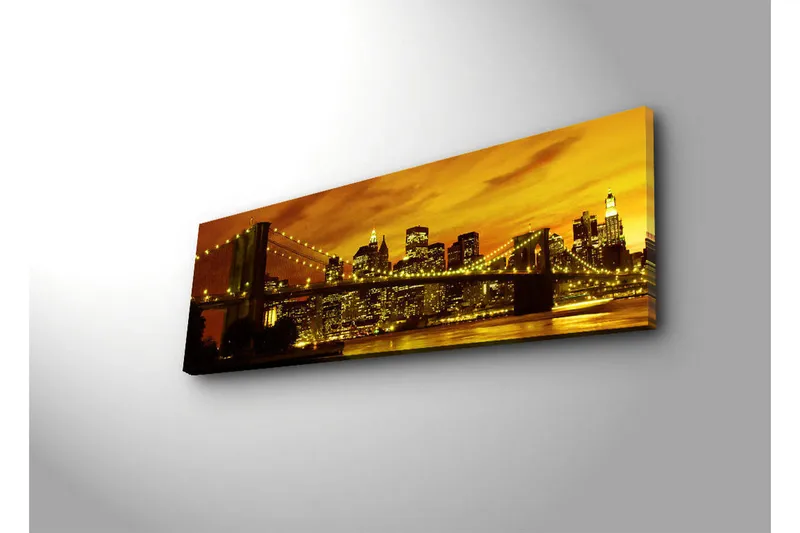 Canvastavla med LED-belysning 30x90 cm - Stadssilhuett med bro i solnedgångens gyllene ljus - Guld / Svart / Orange - Inredning - Tavlor & konst - Canvastavlor