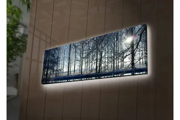 Canvastavla med LED-belysning 30x90 cm - Vinterlandskap med snöklädda träd och en svag solstråle - Blå / Vit / Grå - Inredning - Tavlor & konst - Canvastavlor