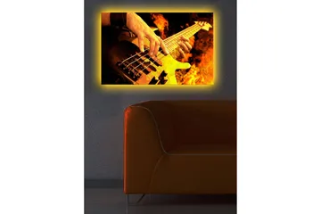 Canvastavla med LED-belysning 45x70 cm - Gitarrist som spelar en elbas omgiven av eldiga flammor - Orange / Svart / Gult - Inredning - Tavlor & konst - Canvastavlor