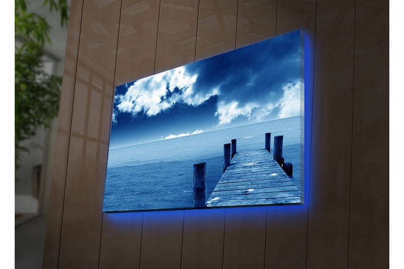 Canvastavla med LED-belysning 45x70 cm - Stilleben av en brygga som sträcker sig ut över ett blått hav under en dramatisk himmel, Blå / Grå / Vit