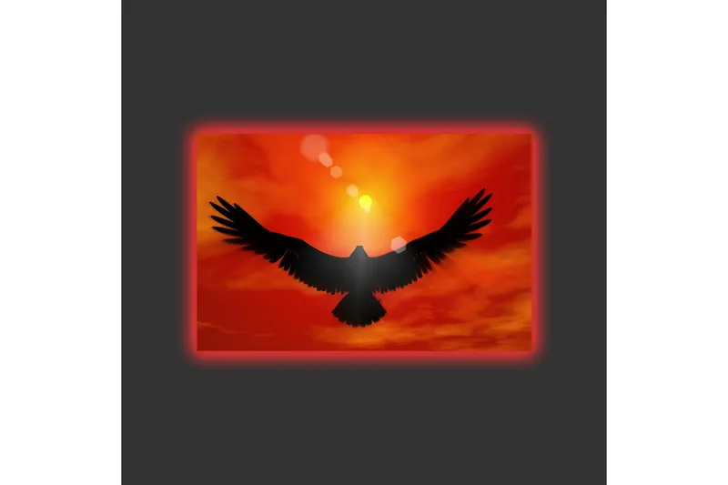 Canvastavla med LED-belysning - Silhuett av en örn som flyger mot en solnedgång i starka färger - Röd / Svart / Orange - Inredning - Tavlor & konst - Canvastavlor