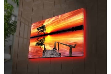 Canvastavla med LED-belysning - Vacker solnedgång över en spegelblanka sjö med en ensam trädbank - Orange / Gul / Svart - Inredning - Tavlor & konst - Canvastavlor